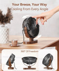 Person adjusting 6.5 Inch USB Desk Fan With Quiet 3 Speed Settings, Ultra Portable Personal Mini Table Fan on wood grain base.