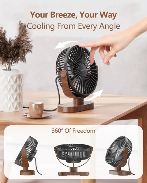 Person adjusting 6.5 Inch USB Desk Fan With Quiet 3 Speed Settings, Ultra Portable Personal Mini Table Fan on wood grain base.