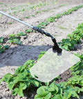 Pro Grade Windproof Sprayer Nozzle With Shield For High Pressure Misting Garden And Farm Crop Spray Coverage Efficient Replacement Part For Agricultural Sprayers in use on strawberry plants