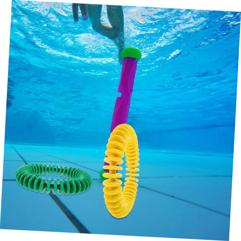 Colorful Soft Plastic Dive Rings For Pool Training And Safe Underwater Games in pool scene with hand grabbing a ring
