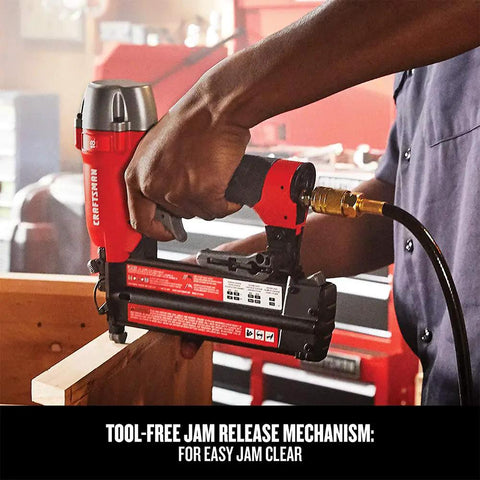 Craftsman 18 Gauge Brad Nailer Pneumatic Nail Gun With Oil-Free Motor in action, focusing on tool-free jam release feature