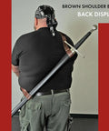 Back view of adjustable genuine leather sword belt for costume and LARP with brown waist strap holding a sword