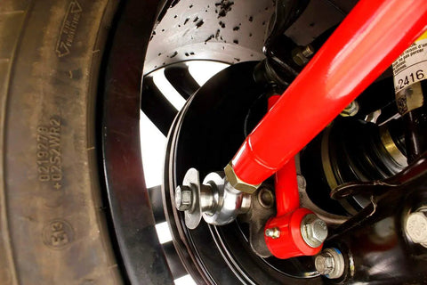 Rear Adjustable Toe Rod Kit With Spherical Rod Ends And Red Powder Coat For Chevy Camaro 2016 close-up of adjustable toe rod on suspension
