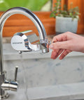 Chrome Faucet Mount Water Filter With WQA Certified PFOA PFOS And Chlorine Reduction, Ninety Eight Percent Lead Reduction in kitchen