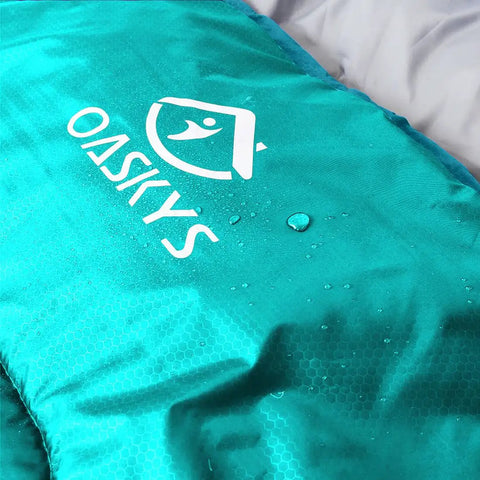 Close-up of Three Season Camping Sleeping Bag for Adults and Kids, lightweight, weatherproof, waterproof, teal 210T shell.
