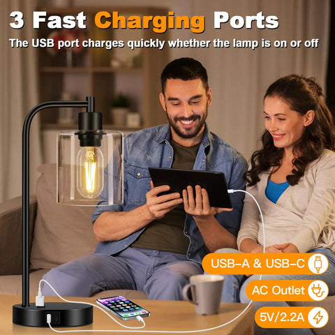 Pair Of Slick Smart Touch Table Lamps With USB C And USB A Ports And AC Outlet, 3 Way Dimmable Black Bedside Lamps, in use on a desk