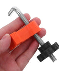 Grab These Sweet 12 Pc Right Angle Clamps For Stone Wood Slabs And Granite To Nail Perfect Masonry Joints Seam Alignment Precise Corner Workholding Like A Total Boss, showing an orange and black clamp in hand.