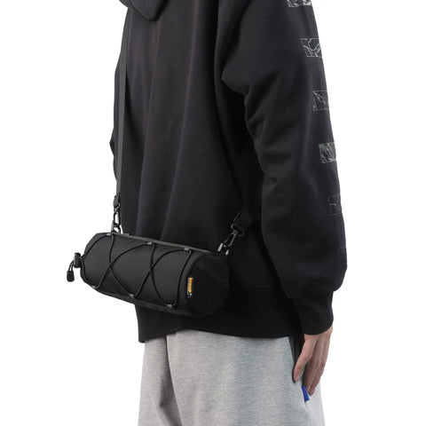 Person wearing Bike Handlebar Bag Front Bag Frame Storage Roll Bag For Mountain And Road Bikes Commuters Grab And Go Storage.