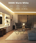 Modern living room illuminated by Dimmable 16.4Ft White LED Strip Light 3000K Warm White Tape Lights For Your Home Setup Kitchen Under Cabinet Bedroom Vanity, 2835 SMD 300 LEDs, Strong 3M Adhesive, Easy Install, Energy Saving.