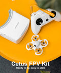 Cetus FPV Kit RTF Brushed Racing Drone Bundle With LiteRadio 2 SE Transmitter And VR02 Goggles on a yellow surface