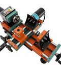 Image of the Get Your Hands On This Badass Mini Wood Lathe, compact dual motor benchtop unit for turning wood and plastic.