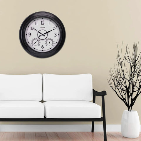 LED Illuminated Outdoor Clock With Temperature And Humidity, 24 Inch Black, Large Bold Arabic Numbers in a living room