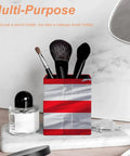 Puerto Rico Flag Pen Holder Desk Organizer With PU Leather Finish holding brushes on a marble surface