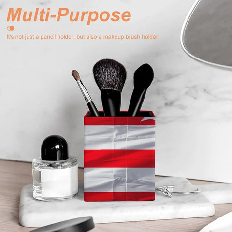 Puerto Rico Flag Pen Holder Desk Organizer With PU Leather Finish holding brushes on a marble surface