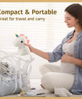 Pregnant woman placing Unicorn Night Light For Kids With Sound Machine, 16 Color Silicone Baby Night Lamp in travel bag.