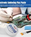 9570 Rosin Soldering Paste Flux No Clean for Electronics applied on circuit board, 2.29oz jar visible with tools