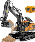 ID Gerilla RC excavator toy with yellow body, black tracks, metal shovel; includes orange remote controller
