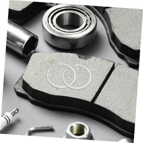 Stainless Steel C Clip Set 5 Pack With Grooved Retaining Rings and Elastic Snap Rings on brake pad