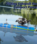 Upgraded Portable Fishing Catapult Rod With Reel For Saltwater And Freshwater resting on lake water surface