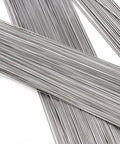 Close-up of stainless steel spring wire bundles, stiff hard straight wires, 40 cm length, 0.2–3 mm gauge