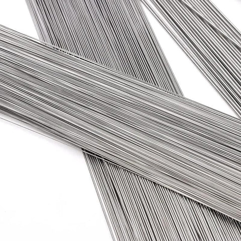 Close-up of stainless steel spring wire bundles, stiff hard straight wires, 40 cm length, 0.2–3 mm gauge