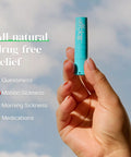 Hand holding Motion And Morning Sickness Nausea Relief Inhaler No Pills Needed Fast Acting Drug Free Non Drowsy All Natural Alternative