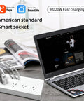 Slick WiFi Smart Power Strip With Eight Plug And Play Outlets Delivering Solid Surge Protection Alongside Pd 20W USB C Fast Charging, with laptop and magazines.