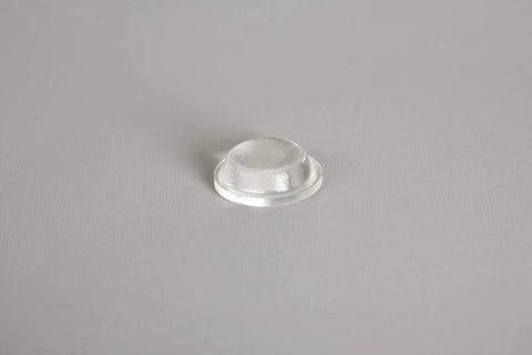 Clear polyurethane self-adhesive furniture foot, 0.5 in dia x 0.14 in tall, close-up front view