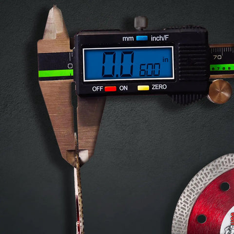 Digital caliper measuring thickness of Boss Hog Supreme Mesh Turbo 7 Inch Diamond Saw Blade 5/8 Inch Arbor Wet Or Dry Cut for Porcelain Tile.