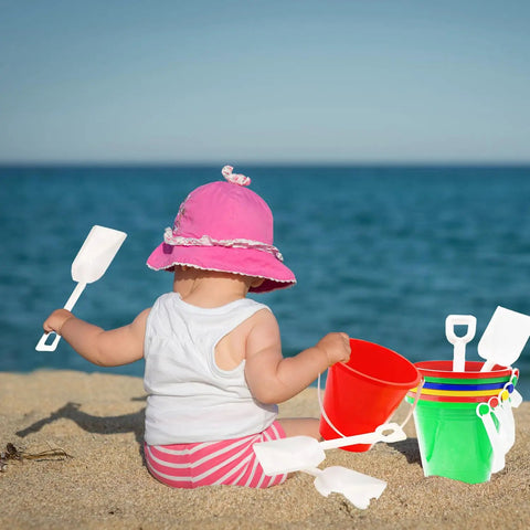 Child playing with Three Pack Beach Toys Set With 5.25 Inch Buckets And Shovels, Kids Sand Play Pails for creative sand creations