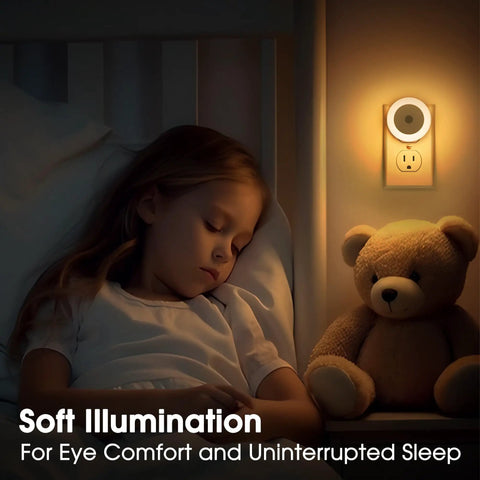 4 Pack Plug In LED Night Lights With Light Sensor Auto On At Dusk For Kids Room And Nursery, warm glow illuminating child and teddy.