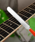 Close-up of fret crowning file on guitar neck from Guitar Fret Leveling Kit For Pros And DIY Hobbyists Includes Fret Leveling Beam