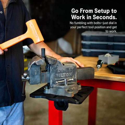 Person using Roto-Mount 360 Degree Rotating Bench Mount for Vises with quick-release tool system on a red workbench.
