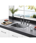 Gourmetier Studio Self Rimming Single Bowl Kitchen Sink GKTS25228 in brushed stainless steel with four faucet holes installed in countertop.