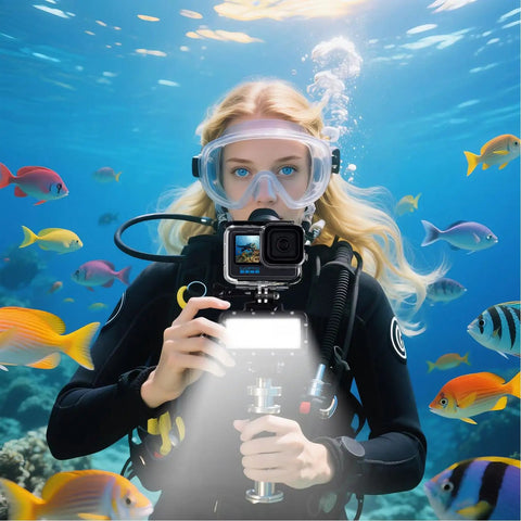 Diver using Ultra Bright Waterproof Dimmable Underwater LED Light For GoPro Hero And DJI Osmo Action, exploring colorful fish at 147ft depth.