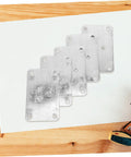 25 Pack Thick Iron Table Leg Plates Heavy Duty Furniture Feet Connectors For Wobbly Couches And Dining Tables Easy DIY Installation on a wooden surface.
