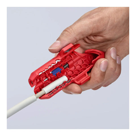 Close-up of Ergostrip Universal Wire Stripping Tool for Right Handed Pros 135 mm Pro Grade Pistol Grip stripping a cable
