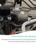 Two Port Billet Aluminum Oil Catch Can Kit With Breather Filter And Drain Valve installed in engine bay