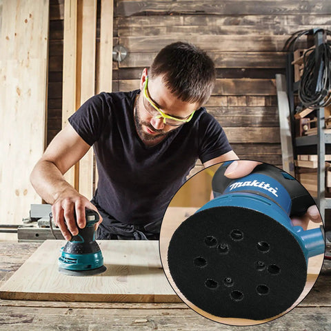 Man using random orbit sander with 5-inch 8-hole sander pad on wood, inset showing Four Pack 5 Inch 8 Hole Sander Pads With Hook And Loop Backing Plates Compatible With Makita DeWalt Porter Cable Hitachi And More 5 Inch Sanding Discs For Random Orbit Sanders.