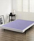 Full Size 4 Inch Low Profile Wood Box Spring Mattress Foundation with memory foam on sturdy frame in modern bedroom.