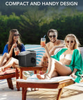 Three people relaxing by a pool with Dope Little Portable Countertop Ice Maker With Self Cleaning And Easy Carry Design on table.