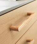 Built Tough Solid White Oak Wood Drawer Knobs For Kitchen Cabinets And Bedroom Dressers Featuring A Modern Single Hole Mount close-up view.