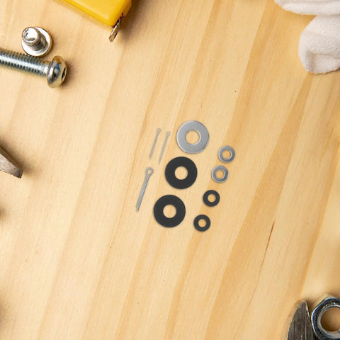Universal Motorcycle Pedal Spacer Washers Quiets Engine Hum And Smashes Vibration set on wooden surface with tools.