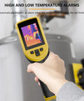 Handheld Thermal Camera With 320x240 TISR Resolution And 120x90 IR High Resolution in use for HVAC inspection
