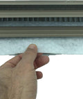 Hand inserting polyester Floor Vent Register Filters 4x12 Inch Breath Easy Everyday With 90 Day Filtration into vent