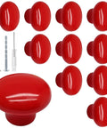 Totally Rad Red Ceramic Cabinet Knobs, 32mm Standard Round Pull Handles For Kitchen Cupboards And Drawers, 10 Pack Set With Screwdriver Included, Charming Decor Accent displayed with screws and screwdriver.