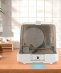 Compact Countertop Dishwasher With See Through Lid And Smart Wash Settings Ideal For Tight Apartments Dorm Life Rv Road Trips And Small Homes on a wooden countertop.
