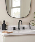 Bathroom with Precept Widespread Matte Black Bathroom Faucet For 3-Hole 6-16 In. Install With ADA Push Pop-Up Drain visible