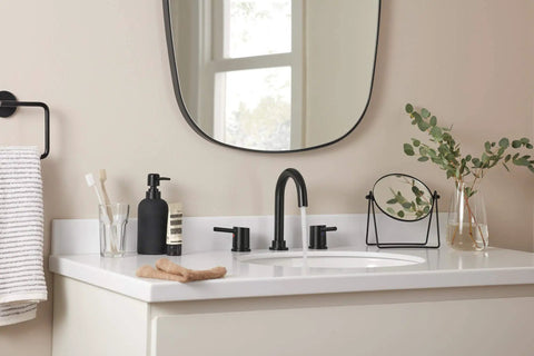 Bathroom with Precept Widespread Matte Black Bathroom Faucet For 3-Hole 6-16 In. Install With ADA Push Pop-Up Drain visible