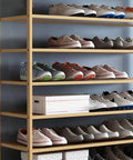 Real Game Changer Stackable Shoe Rack Organizer Vertical Ten Tier Tower With Top Compartment Sturdy shoe storage holding various sneakers.